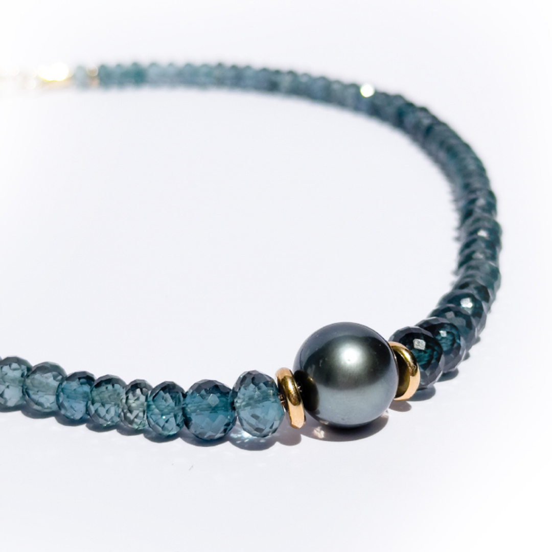 Extremely Rare Teal Blue Topaz and Premium Green Tahitian Pearl Necklace